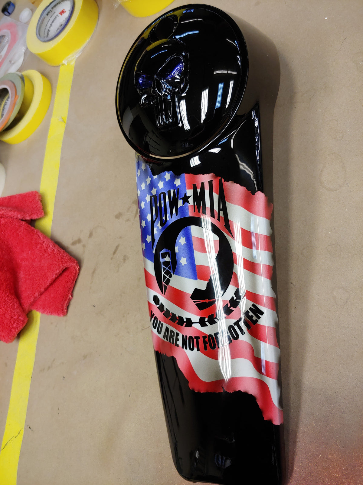 Harley Davidson console with Punisher design and tattered American flag background